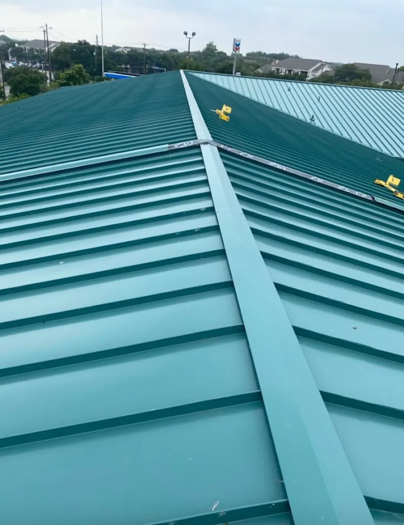 Green commercial metal roof ridge and valley for Metal Roof Repair in Wyndham