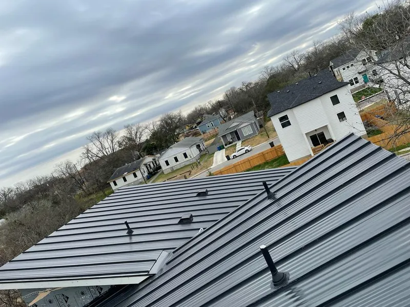 Standing seam metal roof panels with vents for Skylight Repair in Wyndham